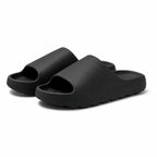 Black EVA platform slide slippers front view on white