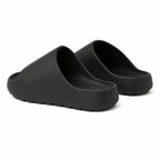 Black EVA platform slide slippers rear view on white