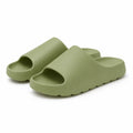 Green EVA platform slide slippers on a white background