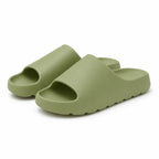 Green EVA platform slide slippers on a white background