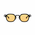 CAPRI polarized round browline sunglasses, black frame with amber lens, front view on pure white