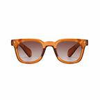 Legacy MEDELLIN Tangerine frame brown lens front on pure white background